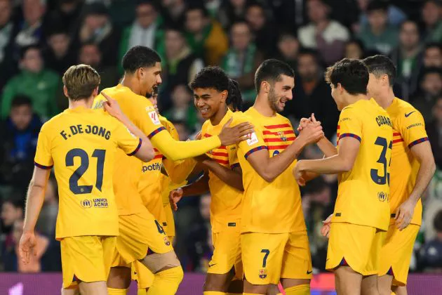 Ferran Torres of FC Barcelona celebrates scoring his team's second goal with teammates during the LaLiga EA Sports match between Real Betis and FC Barcelona at Estadio Benito Villamarin on January 21, 2024 in Seville, Spain.