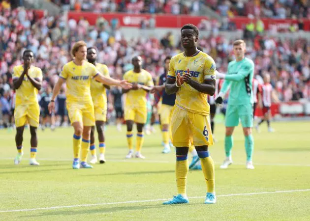 Marc Guehi of Crystal Palace reacts as he acknowledges the fans following defeat to Brentford after the Premier League match between Brentford FC and Crystal Palace FC at Gtech Community Stadium on August 18, 2024 in Brentford, England.