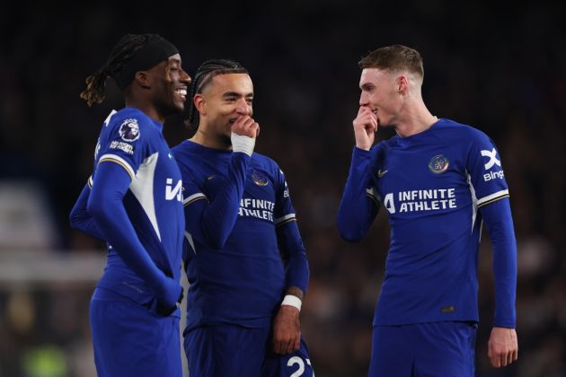 Cole Palmer of Chelsea (R) interacts with teammates Noni Madueke (L) and Malo Gusto (C) during the Premier League match between Chelsea FC and Everton FC at Stamford Bridge on April 15, 2024 in London, England.