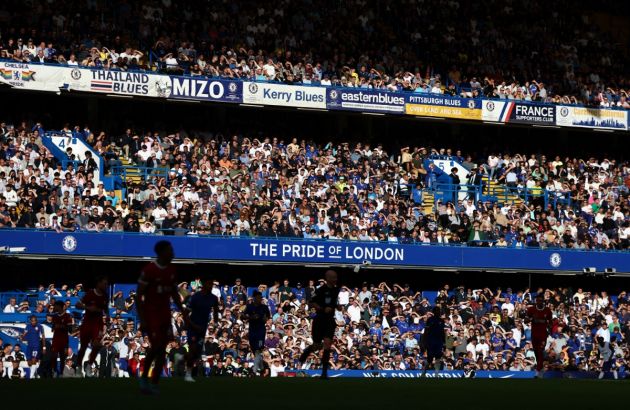 Fans and spectators watch the play during the English Premier League football match between Chelsea and Liverpool at Stamford Bridge in London on August 13, 2023.