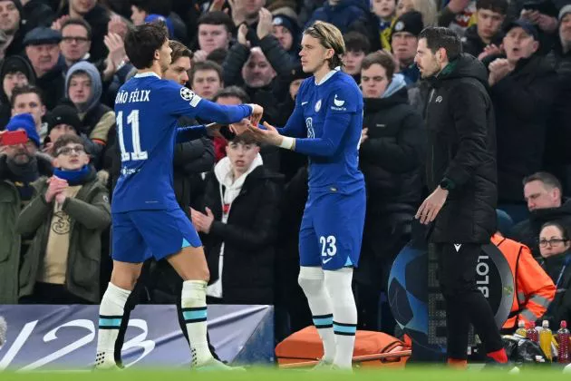 Chelsea's Portuguese striker Joao Felix leaves the pitch after being substituted off for Chelsea's English midfielder Conor Gallagher (C) during the UEFA Champions League round of 16 second-leg football match between Chelsea and Borrusia Dortmund at Stamford Bridge in London on March 7, 2023.