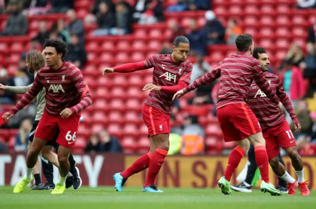 Virgil van Dijk, Sadio Mane and Trent Alexander-Arnold of Liverpool warms up during the pre-season friendly match between Liverpool and Athletic Club at Anfield on August 08, 2021 in Liverpool, England.