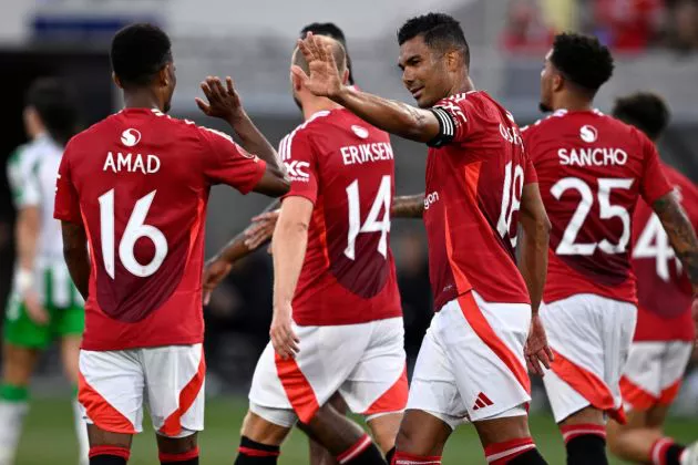 Casemiro #18 of Manchester United celebrates with Amad Diallo #16 after scoring a goal against Real Betis during the first half at Snapdragon Stadium on July 31, 2024 in San Diego, California.