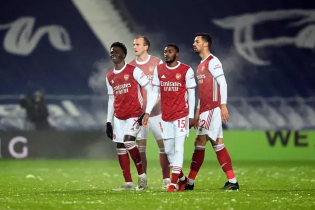 Bukayo Saka of Arsenal reacts as he is substituted alongside teammates Rob Holding, Ainsley Maitland-Niles and Pablo Mari during the Premier League match between West Bromwich Albion and Arsenal