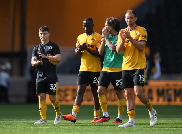 Joe Hodge, Toti Gomes, Fabio Silva and Craig Dawson of Wolverhampton Wanderers applaud the fans after the team's defeat in the Premier League match between Wolverhampton Wanderers and Brighton & Hove Albion at Molineux on August 19, 2023 in Wolverhampton, England.