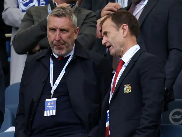 BRIGHTON, ENGLAND - AUGUST 24: Technical director Jason Wilcox and Sporting director Dan Ashworth of Manchester United FC during the Premier League match between Brighton & Hove Albion FC and Manchester United FC at Amex Stadium on August 24, 2024 in Brighton, England.