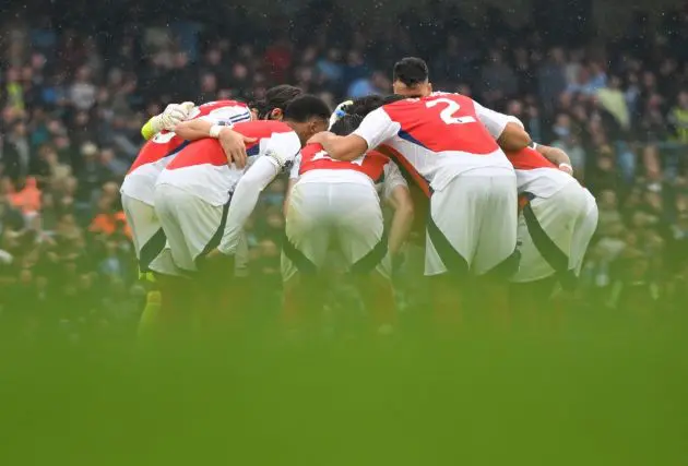 man city vs arsenal player huddle