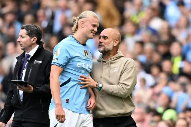 MANCHESTER, ENGLAND - AUGUST 24: Erling Haaland of Manchester City celebrates scoring his team's fourth goal and his hat-trick with Pep Guardiola, Manager of Manchester City, during the Premier League match between Manchester City FC and Ipswich Town FC at Etihad Stadium on August 24, 2024 in Manchester, England.