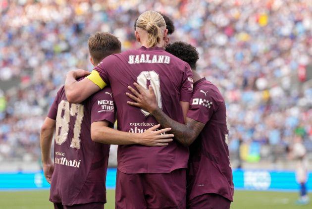 Oscar Bobb with his Man City teammates