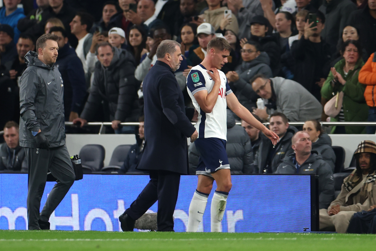 Tottenham's Micky van de Ven walks off injured against Man City