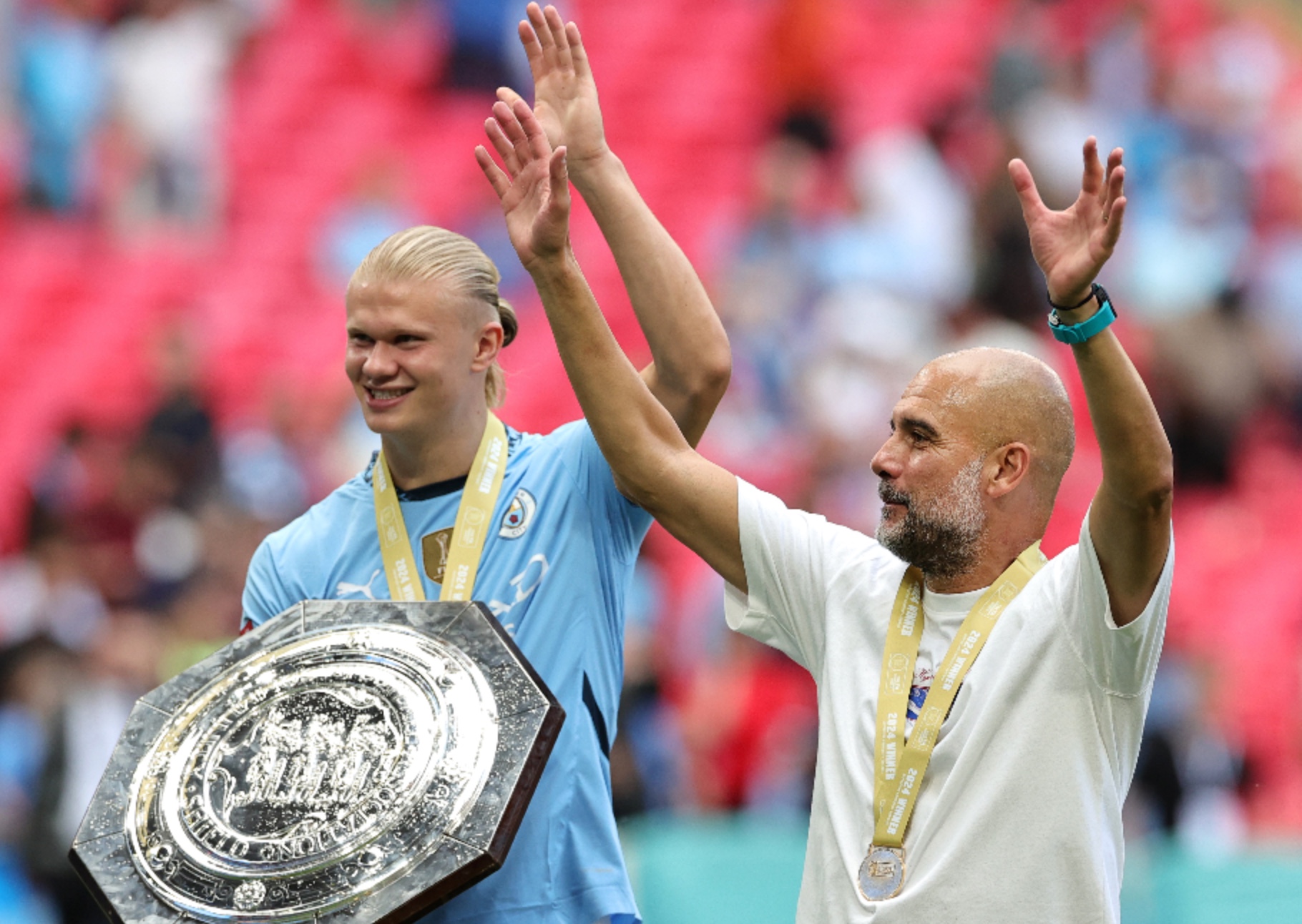 Erling Haaland and Pep Guardiola with the Charity Shield