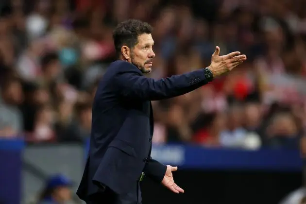 Diego Simeone instructing Atletico Madrid from the sidelines.