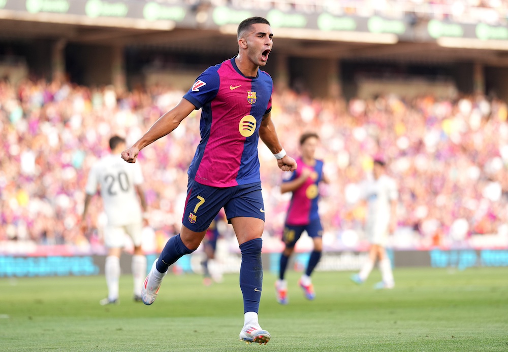 Ferran Torres celebrates a goal for Barcelona.