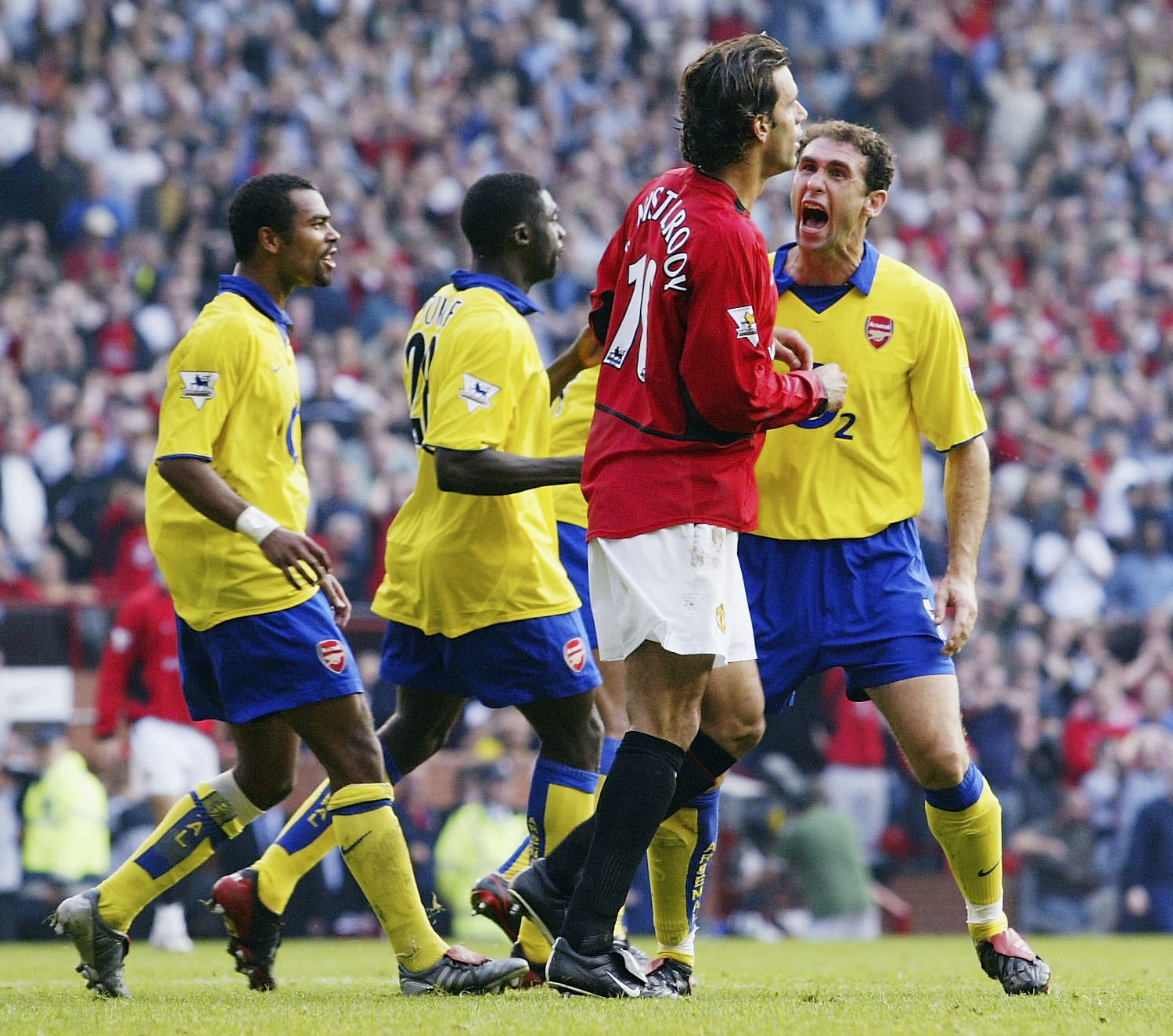 Arsenal and Manchester United players during the 'battle of Old Trafford'