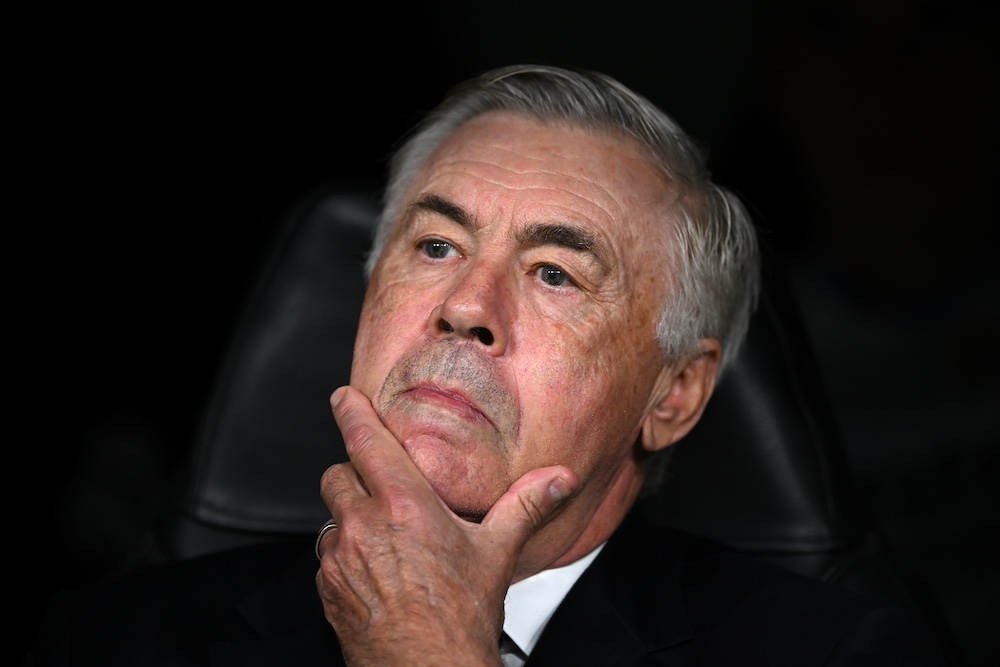 Carlo Ancelotti watching on as Barcelona thumped Real Madrid 4-0.