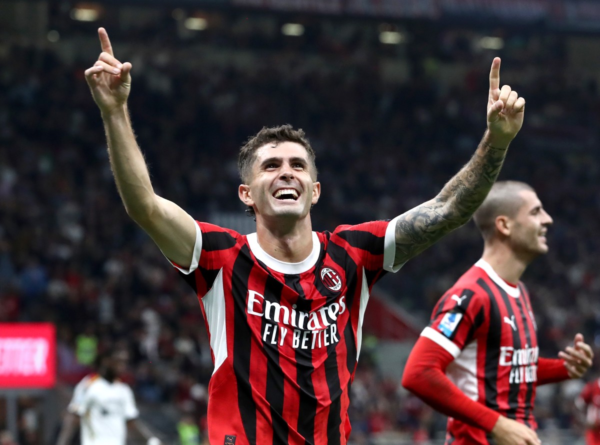 Christian Pulisic celebrates a goal for AC Milan against Lecce