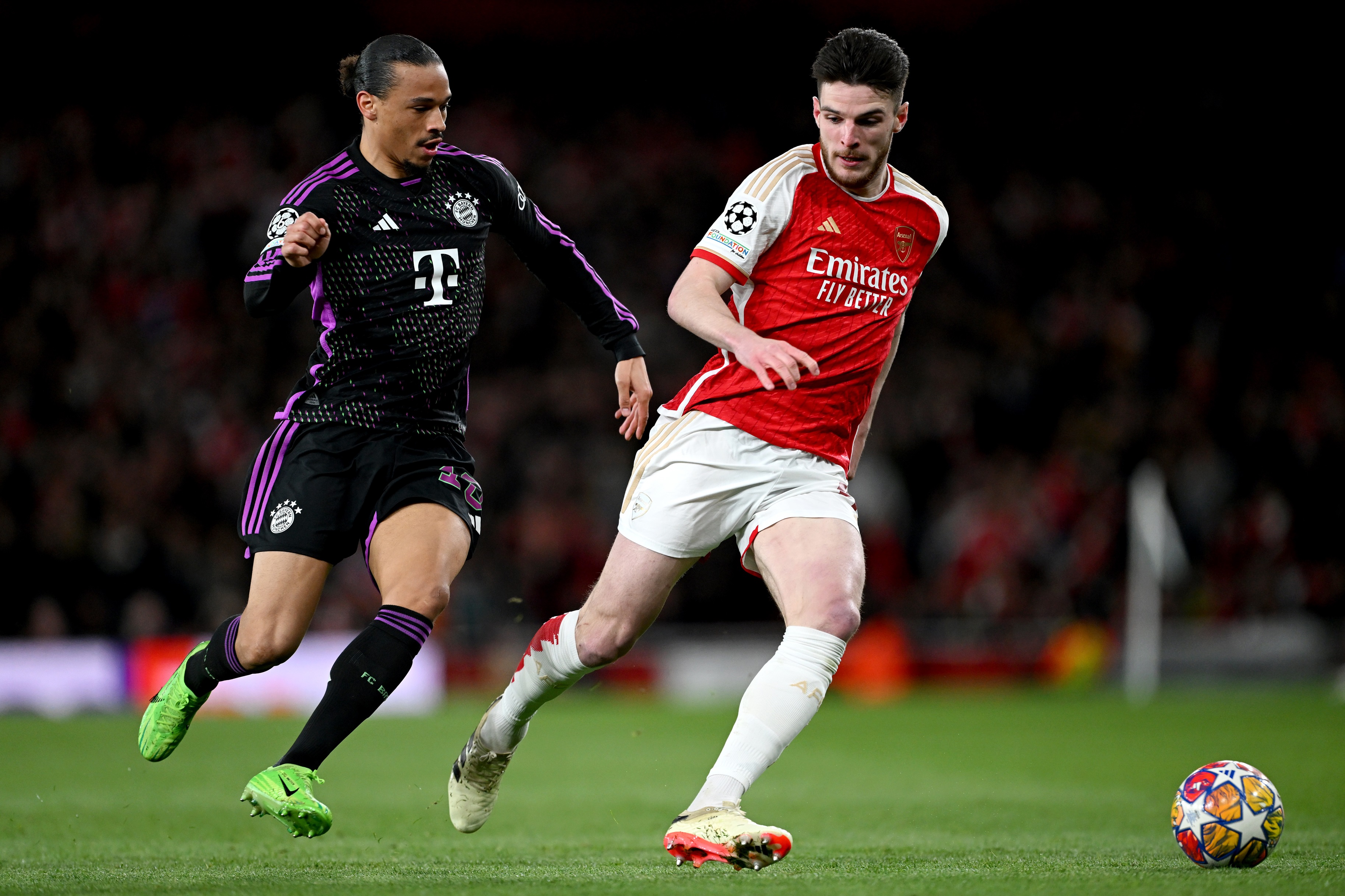 Manchester United target Leroy Sané competes with Arsenal midfielder Declan Rice.