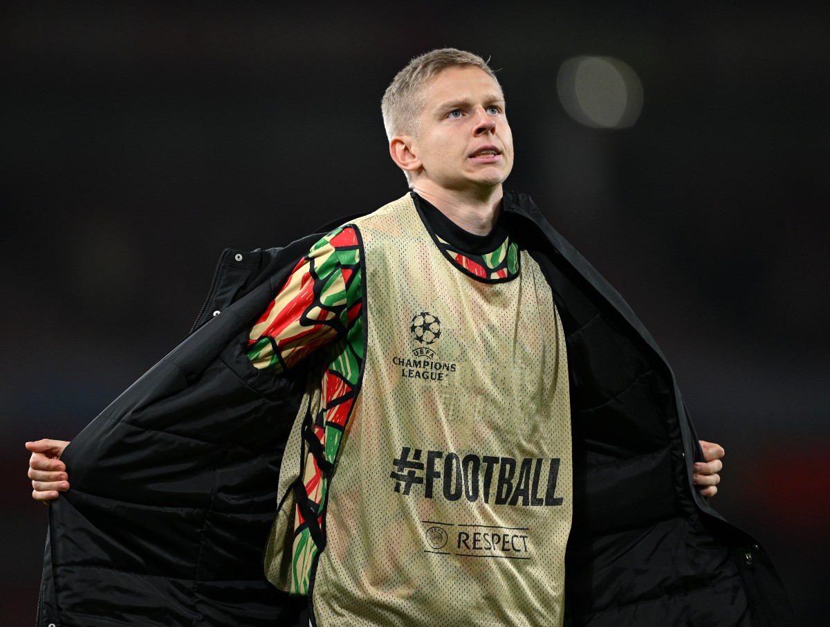 Oleksandr Zinchenko preparing to come on for Arsenal