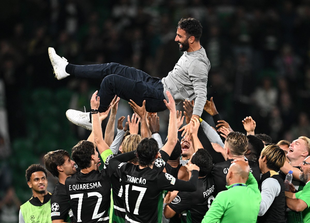 Sporting Lisbon players carry Ruben Amorim in his final game in charge