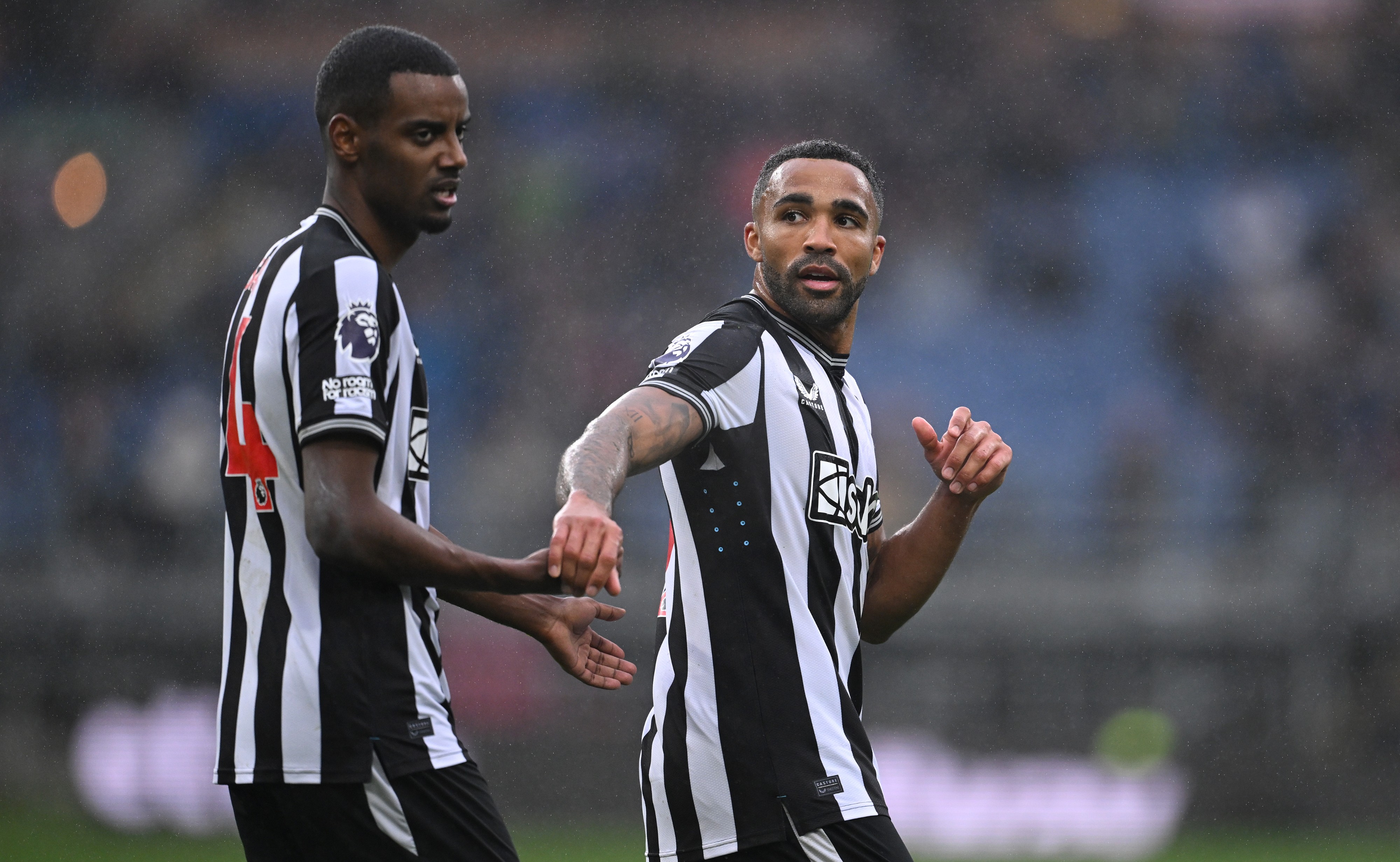 Alexander Isak of Newcastle United and Callum Wilson during the Premier League match between Burnley FC and Newcastle United