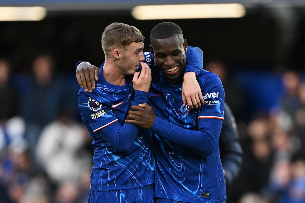 Cole Palmer (left) and Nicolas Jackson (right) celebrating while in action for Chelsea.