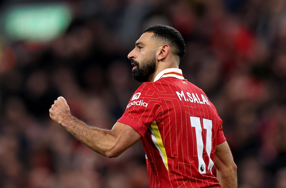 Mo Salah celebrating after scoring a goal for Liverpool.