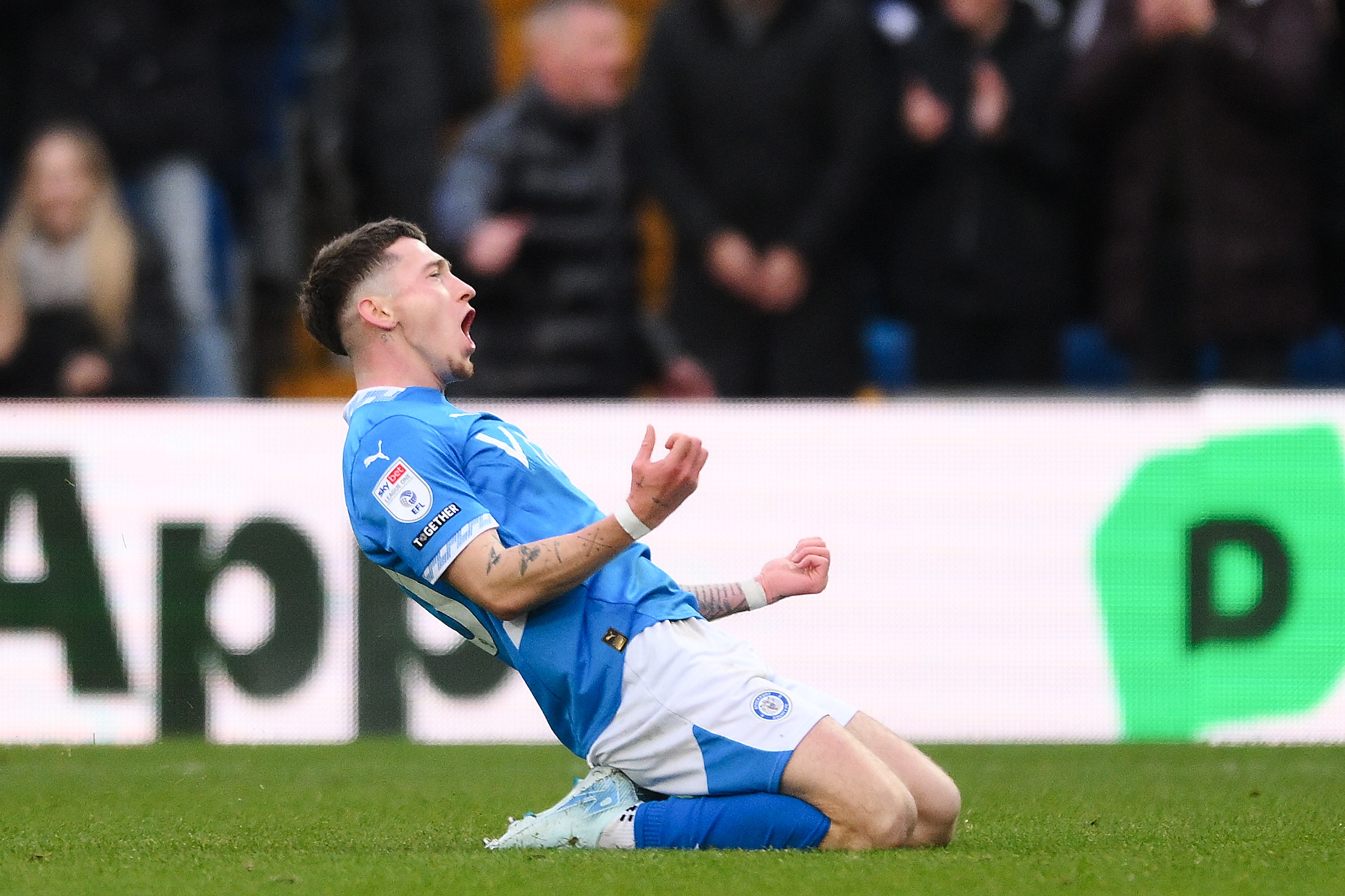 Louie Barry of Stockport County celebrates