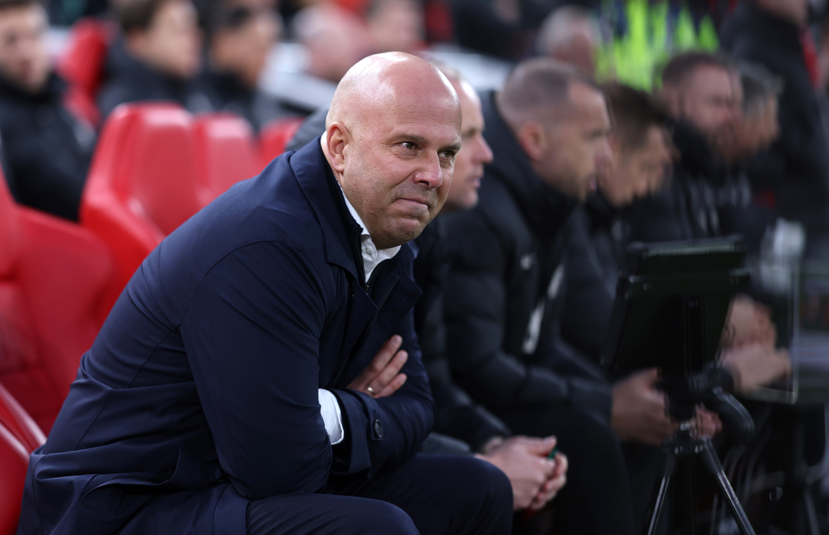 Liverpool manager Arne Slot sitting on the bench against Fulham