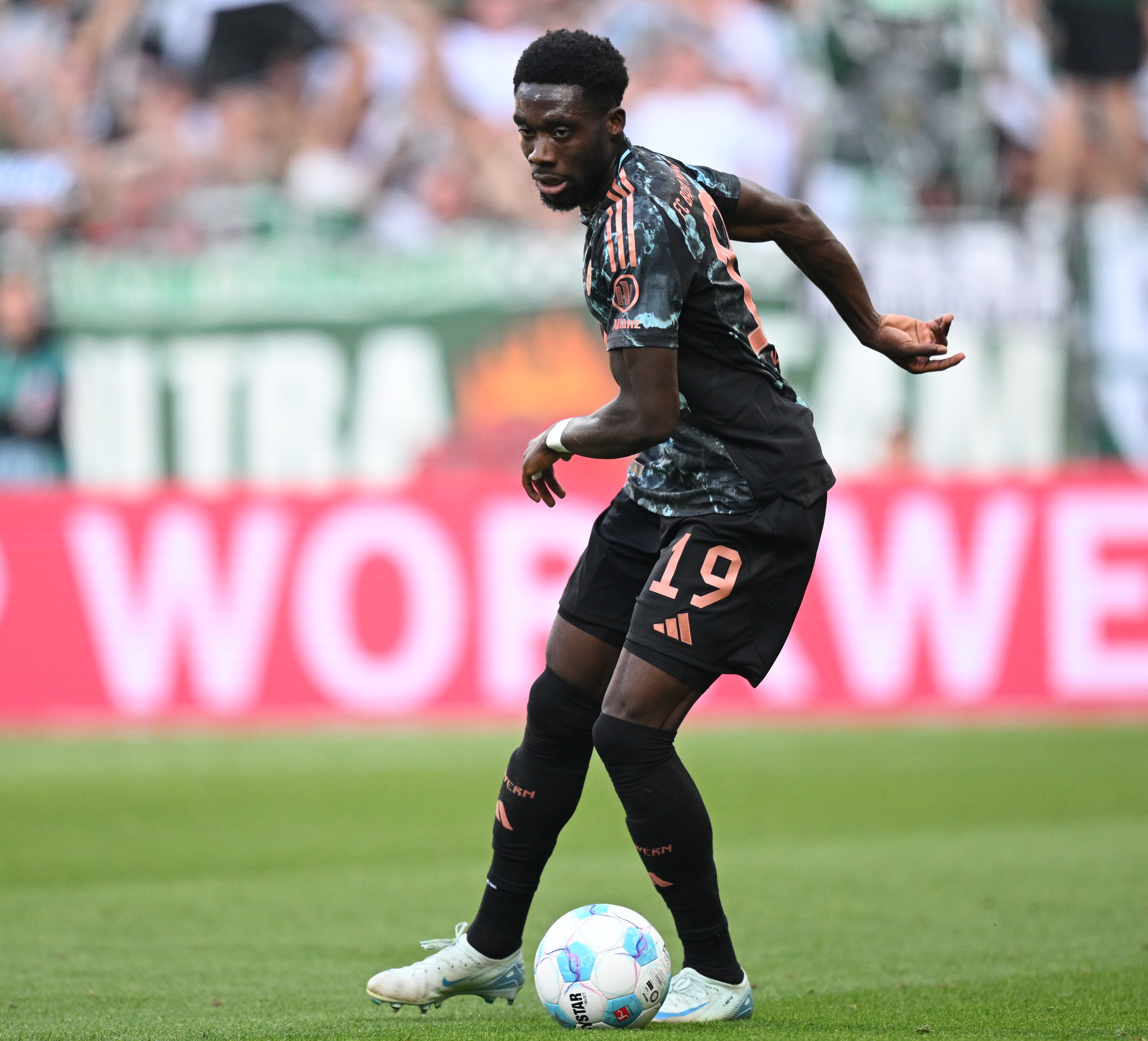 Alphonso Davies in action for Bayern Munich this season