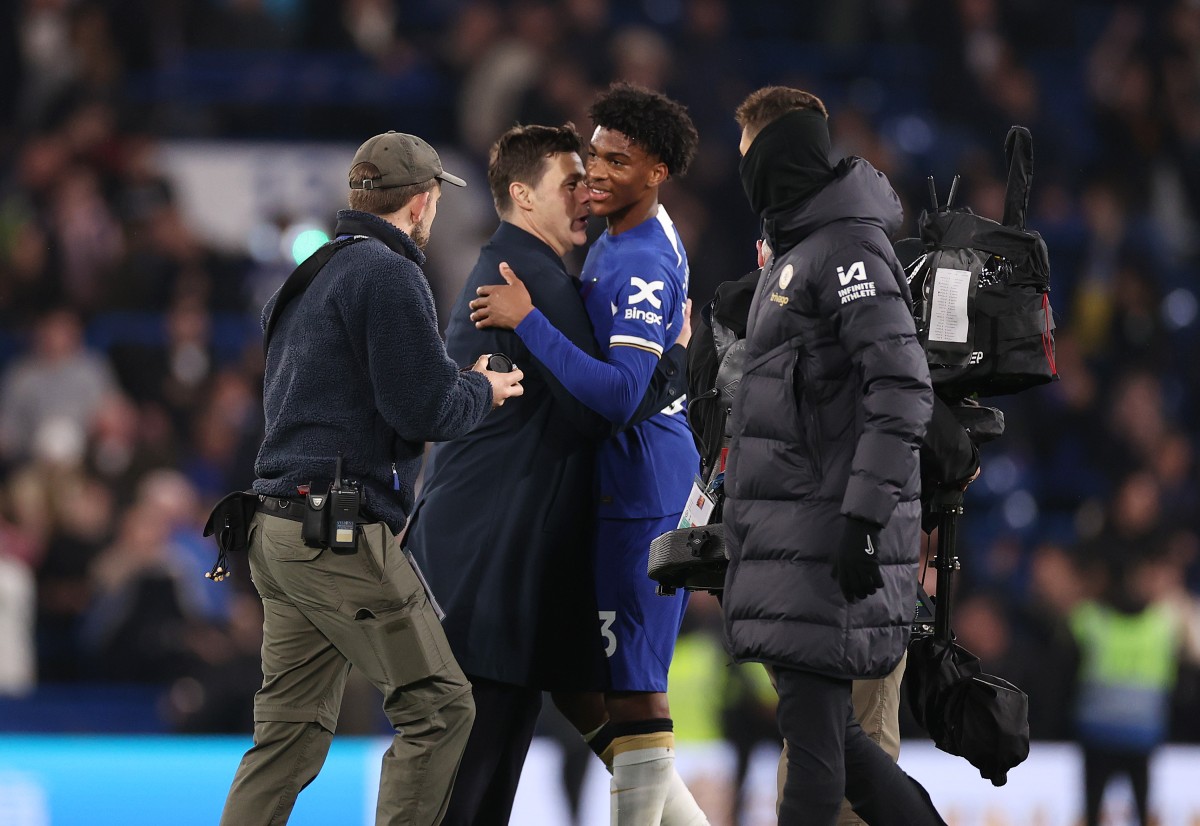 Josh Acheampong with former Chelsea manager Mauricio Pochettino last season