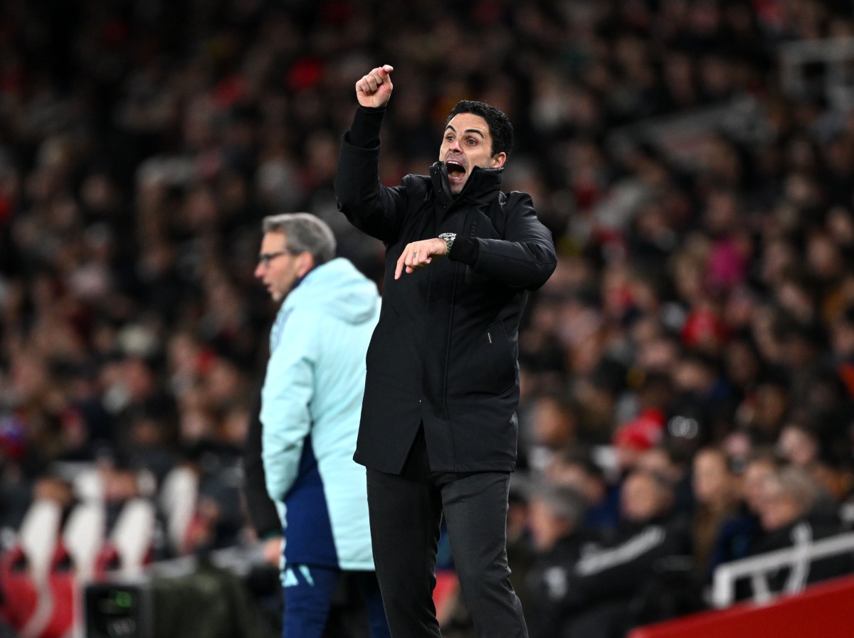 Mikel Arteta gestures during Arsenal's win over Monaco