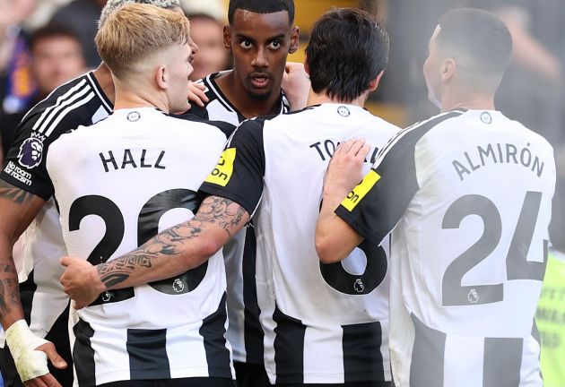 Newcastle players celebrate together
