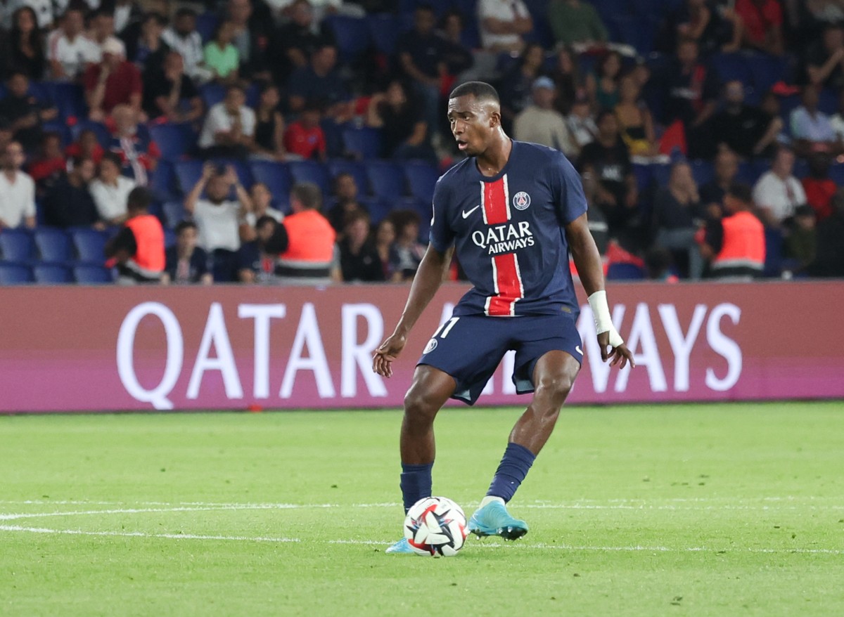 Willian Pacho in action for PSG