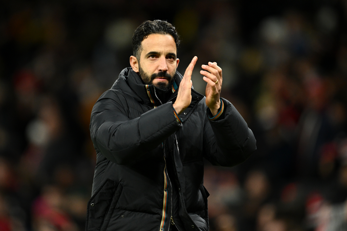 Man United manager Ruben Amorim claps the fans