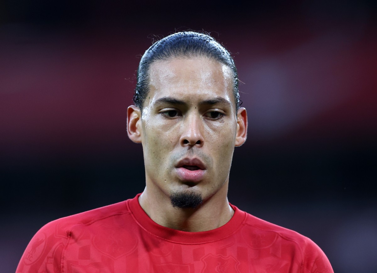 Virgil van Dijk warming up for Liverpool