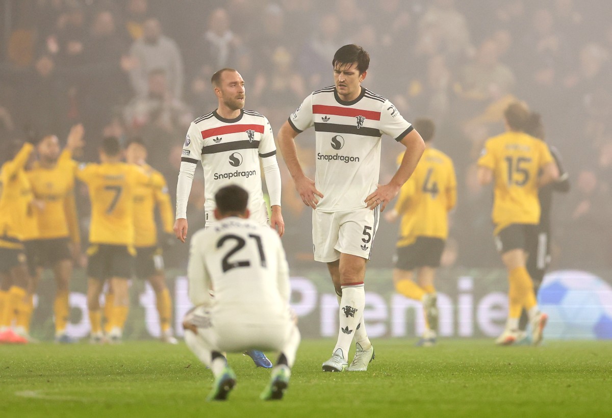 Harry Maguire and Christian Eriksen react as Wolves beat Manchester United