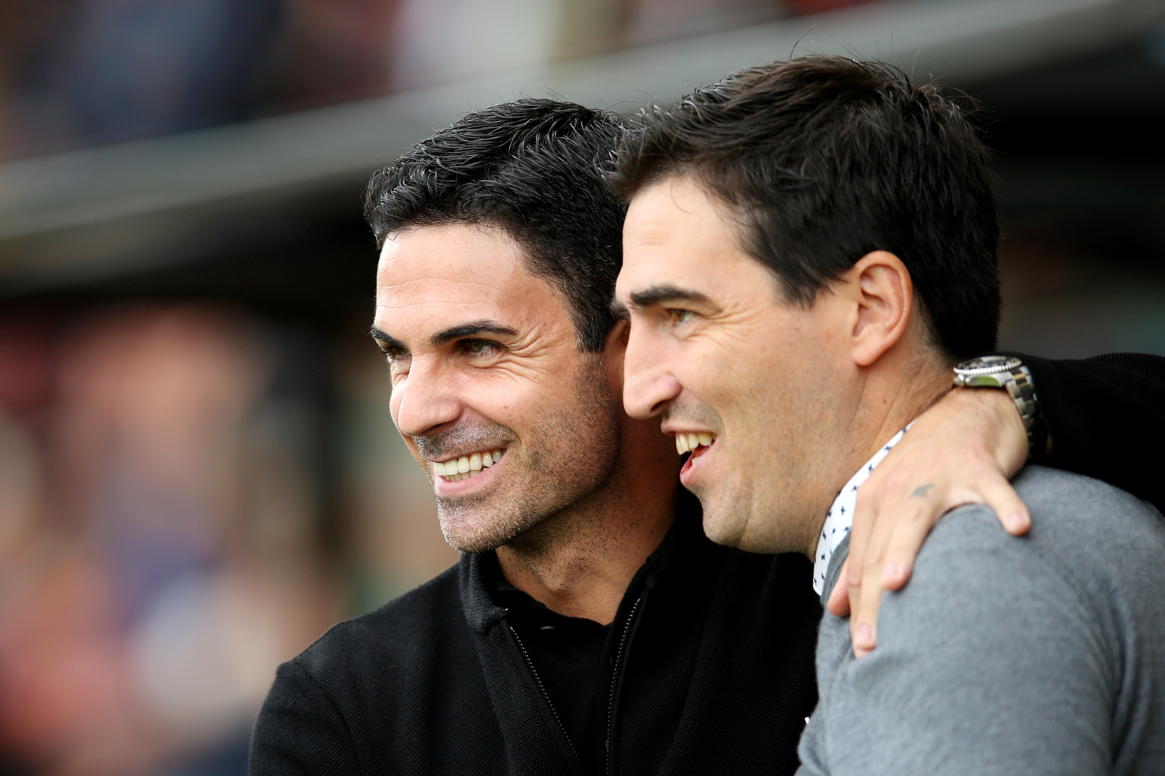 Mikel Arteta embraces Andoni Iraola