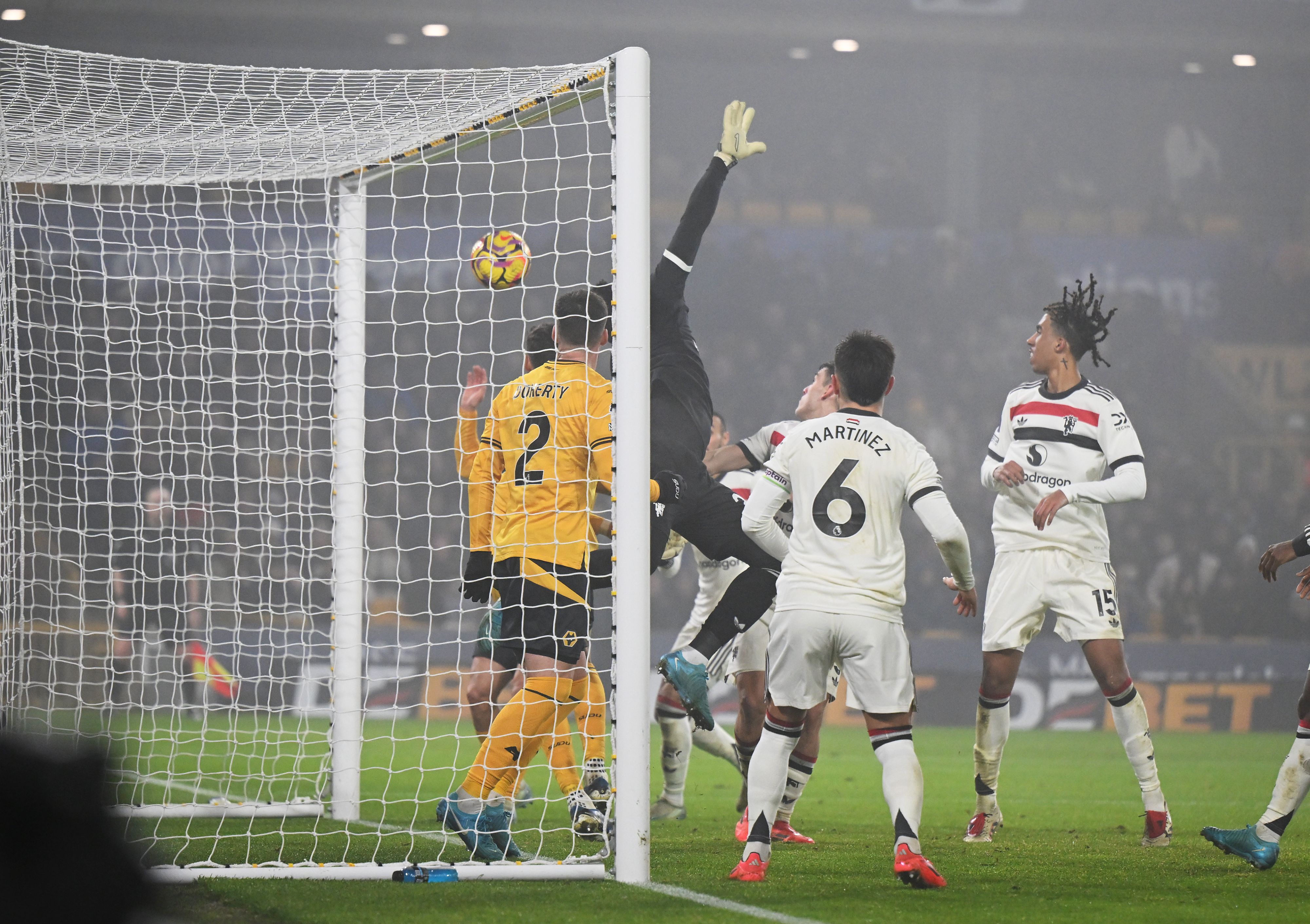 Matheus Cunha of Wolverhampton Wanderers (not pictured) scores his team's first goal past Andre Onana of Manchester United direct from a corner kick. 