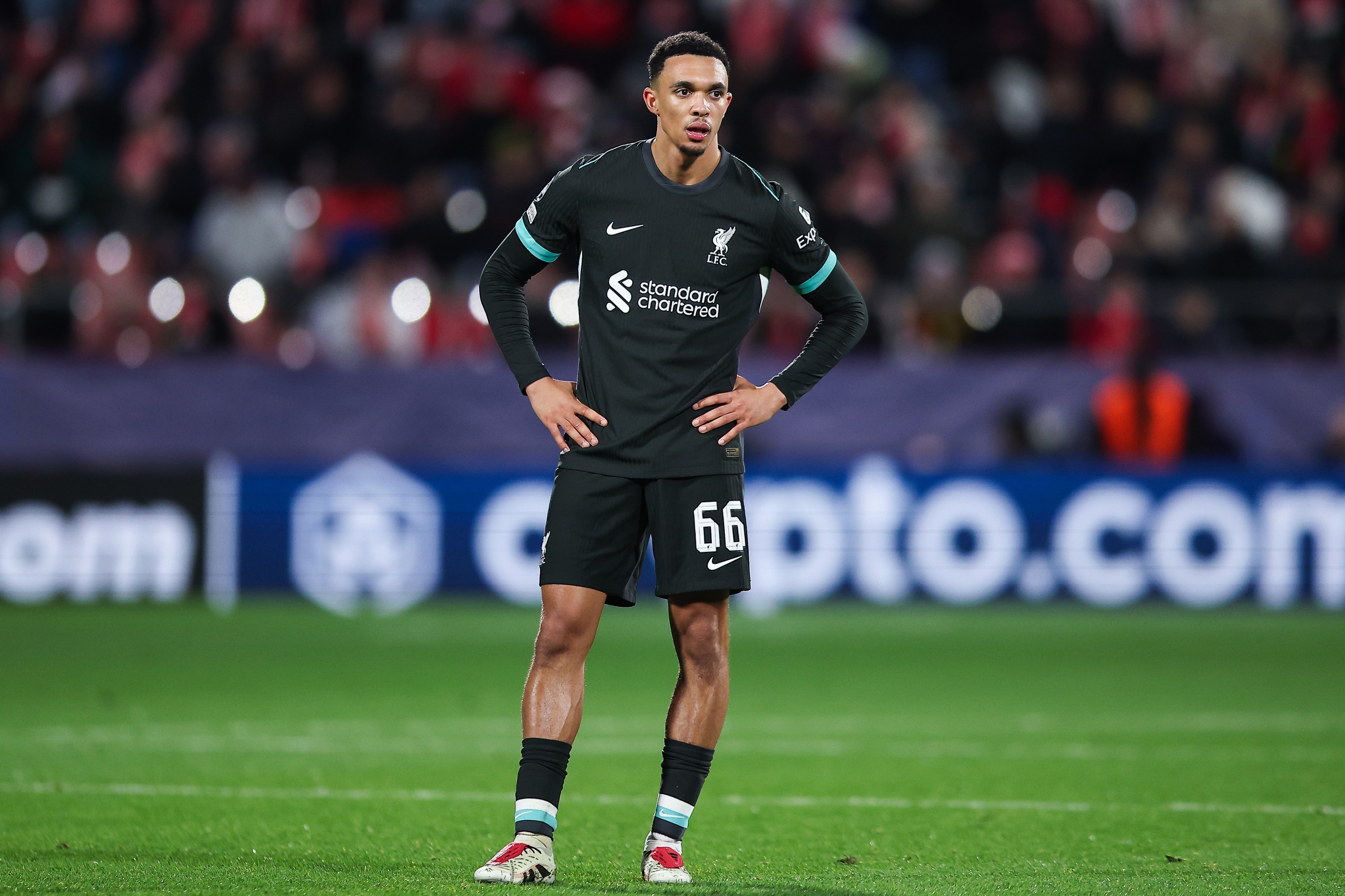 Trent Alexander-Arnold of Liverpool looks on