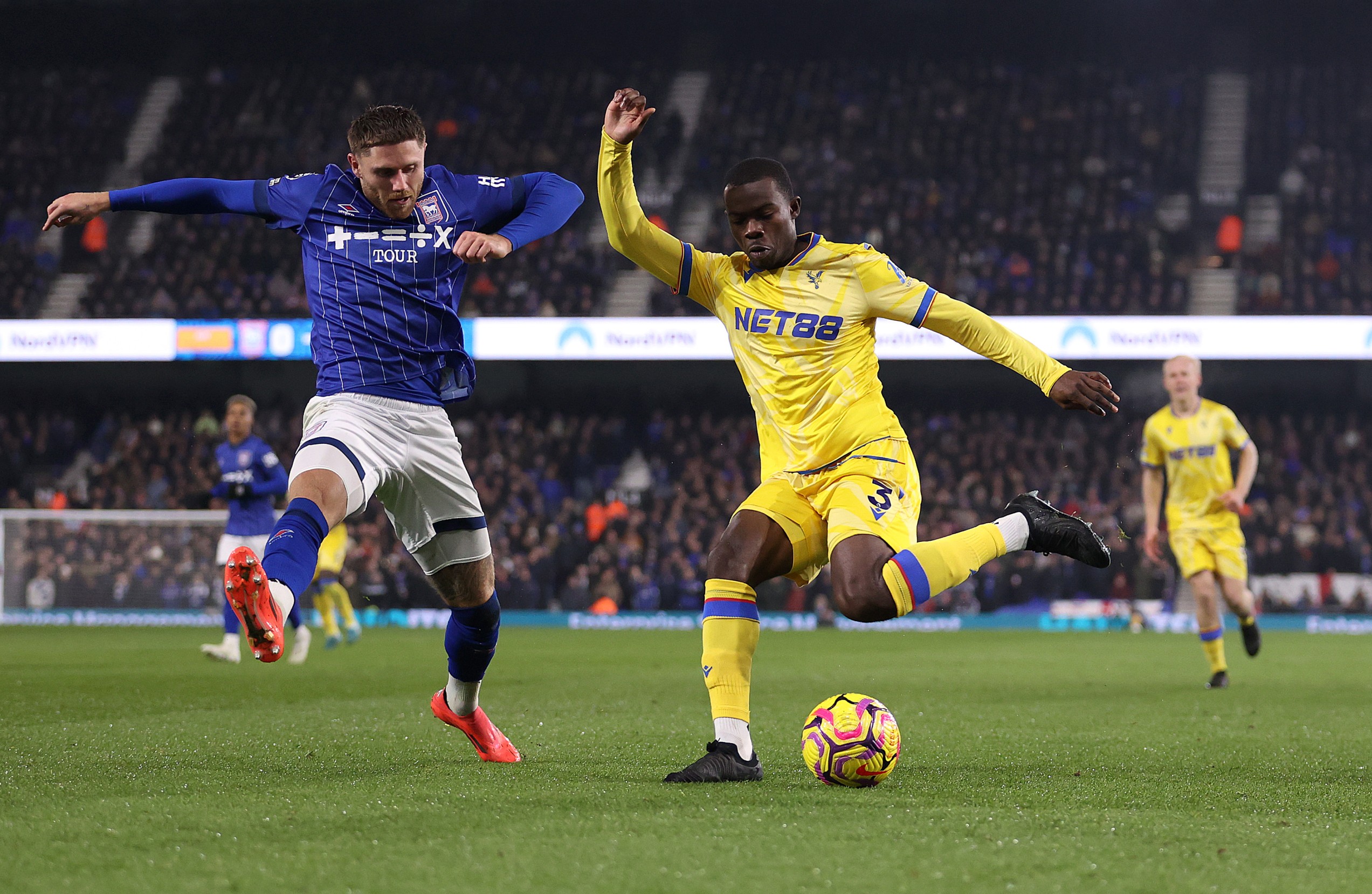 Tyrick Mitchell of Crystal Palace passes the ball