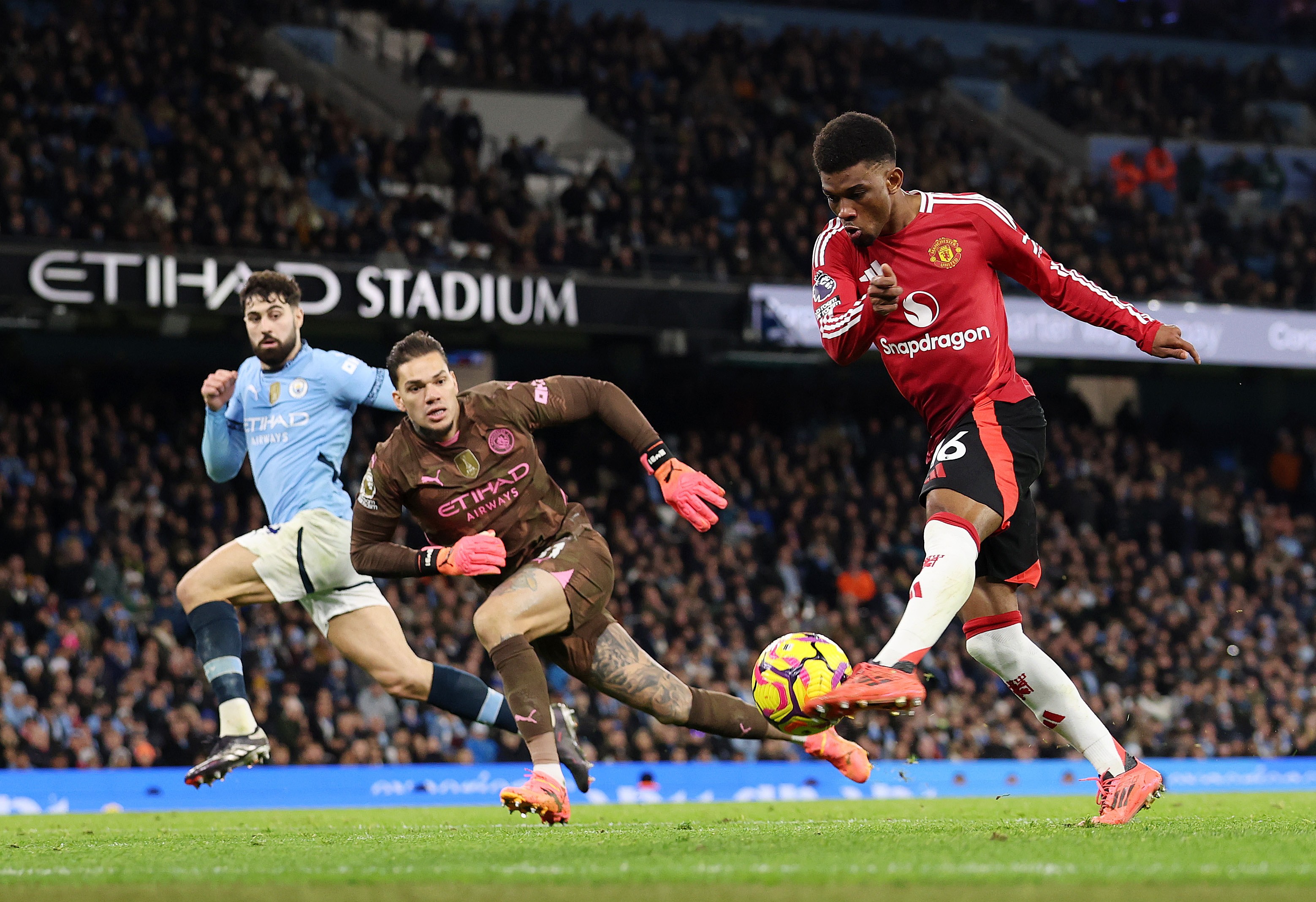 Manchester United's Amad Diallo scores