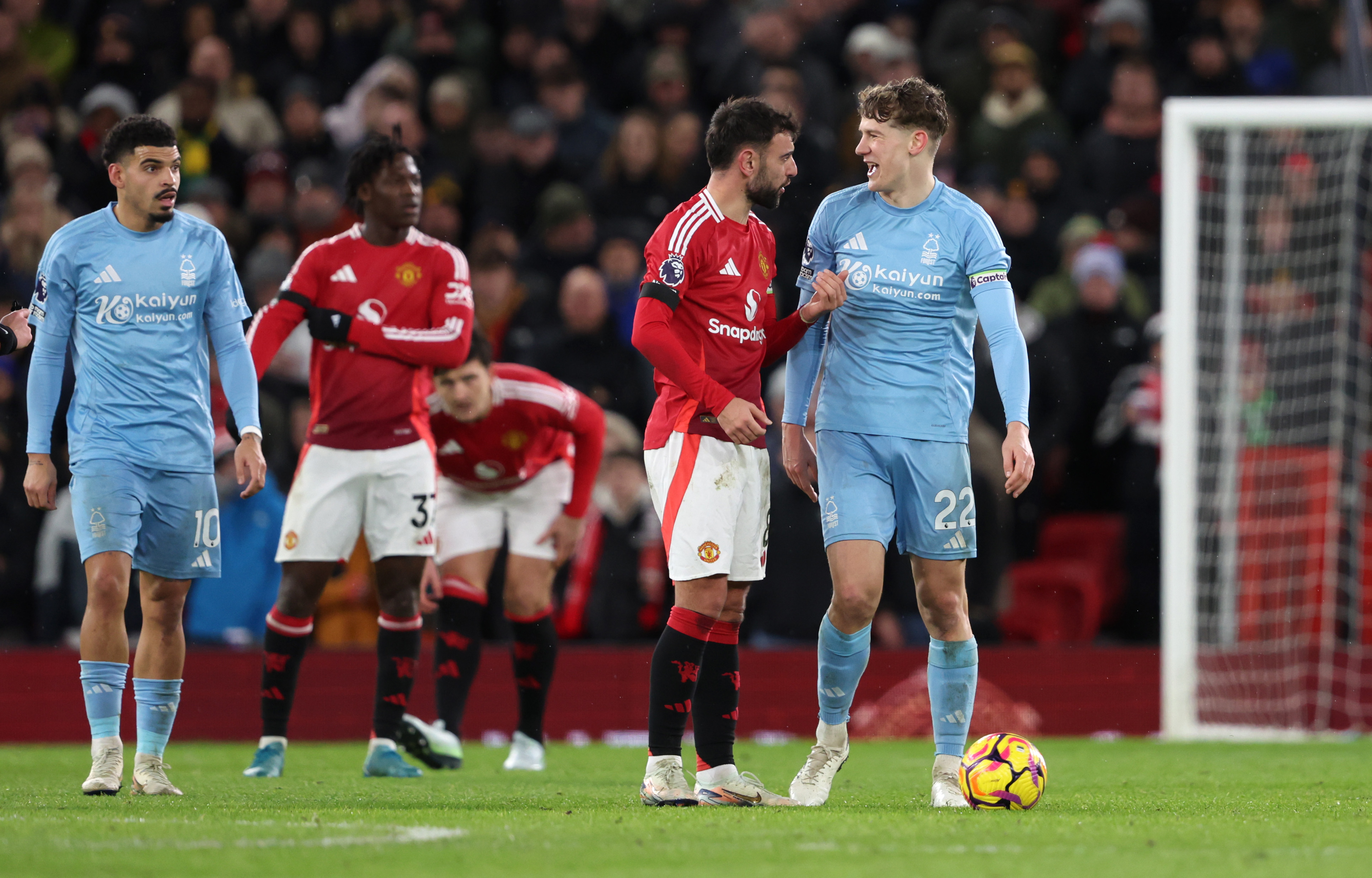 Bruno Fernandes of Manchester United clashes with Ryan Yates 