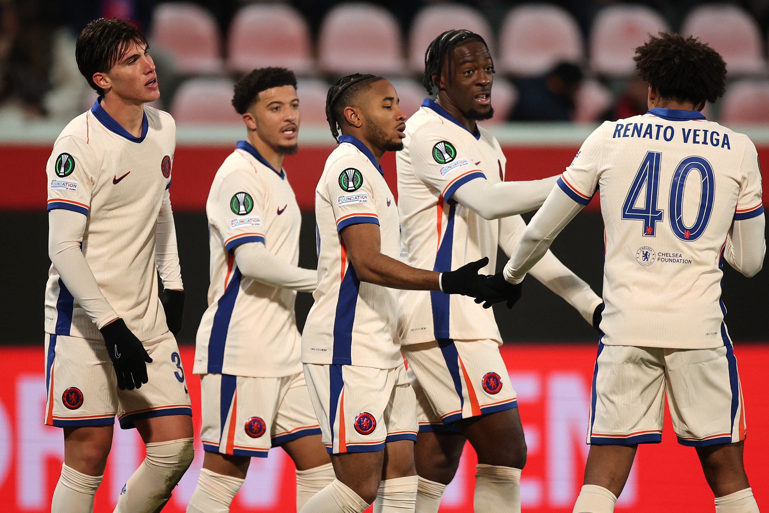 Chelsea's Christopher Nkunku celebrates with his teammates