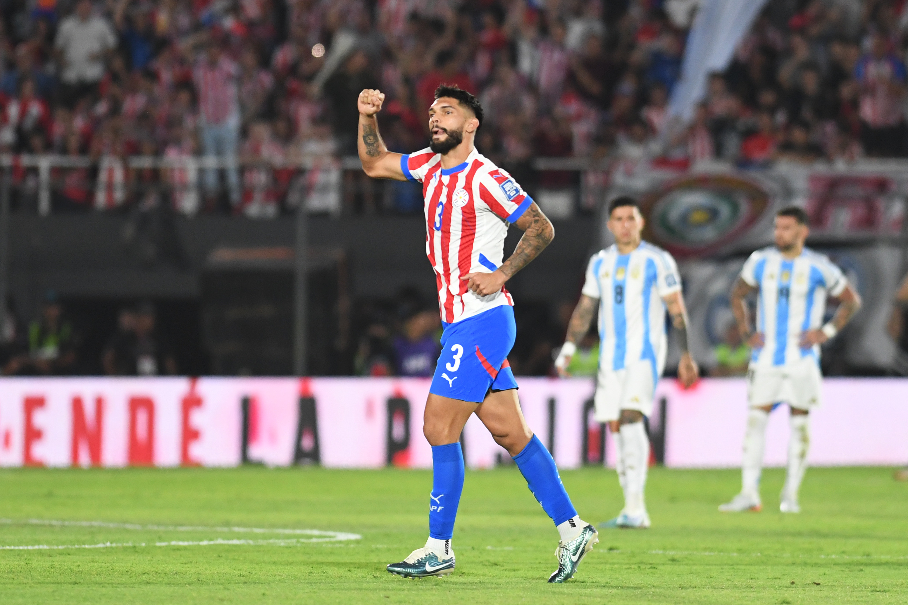 Omar Alderete of Paraguay celebrates after scoring