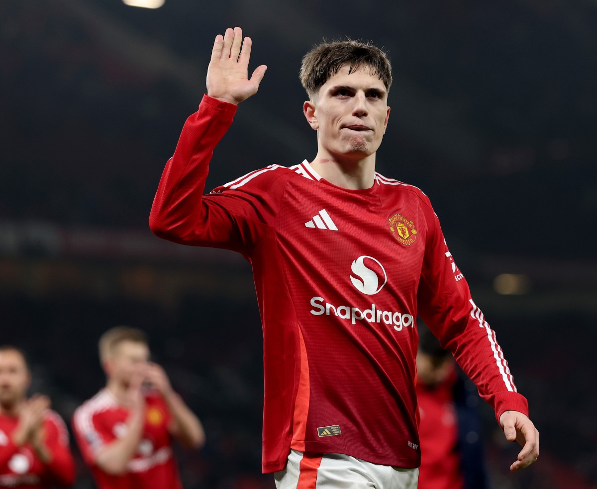 Alejandro Garnacho waves to the Manchester United fans