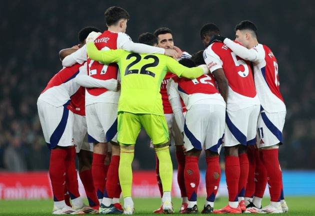 Arsenal players huddle ahead of the game against Aston Villa