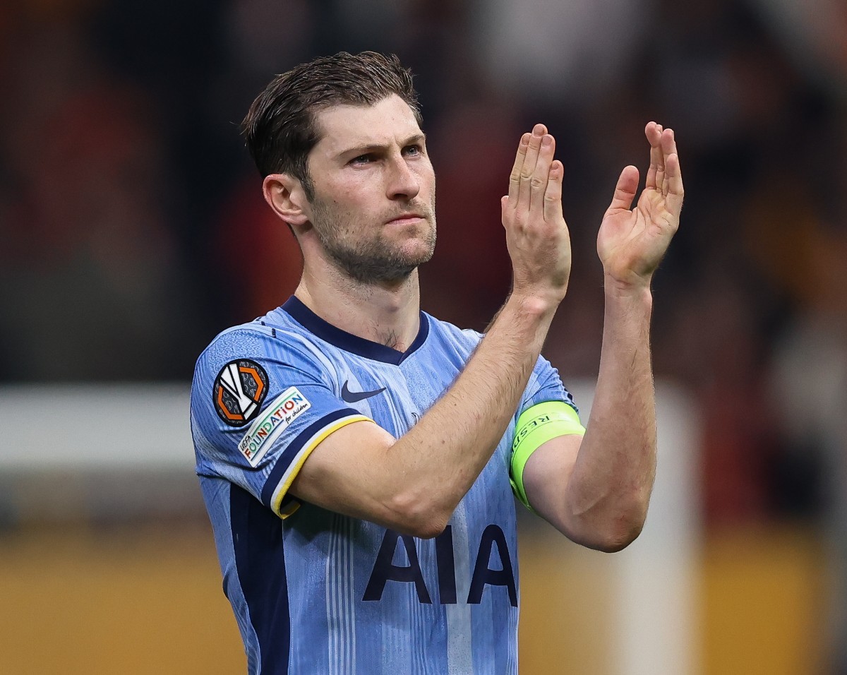 Ben Davies applauds the Tottenham fans