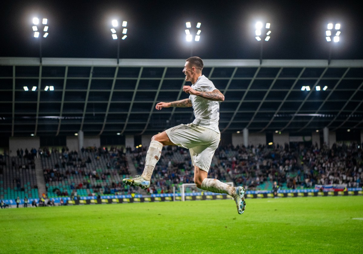 Benjamin Sesko celebrates a goal for Slovenia