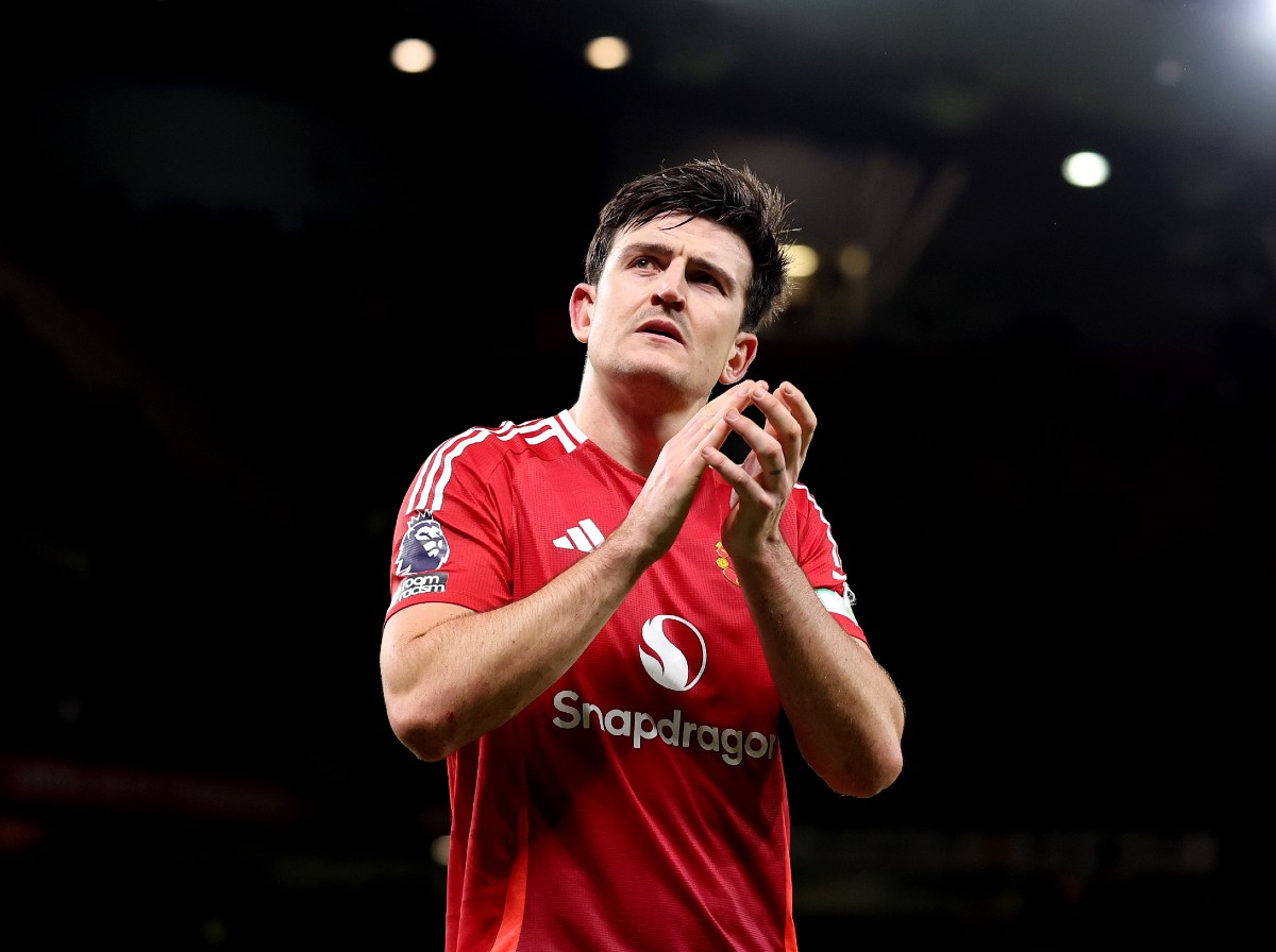 Harry Maguire applauds the Man Utd fans at Old Trafford