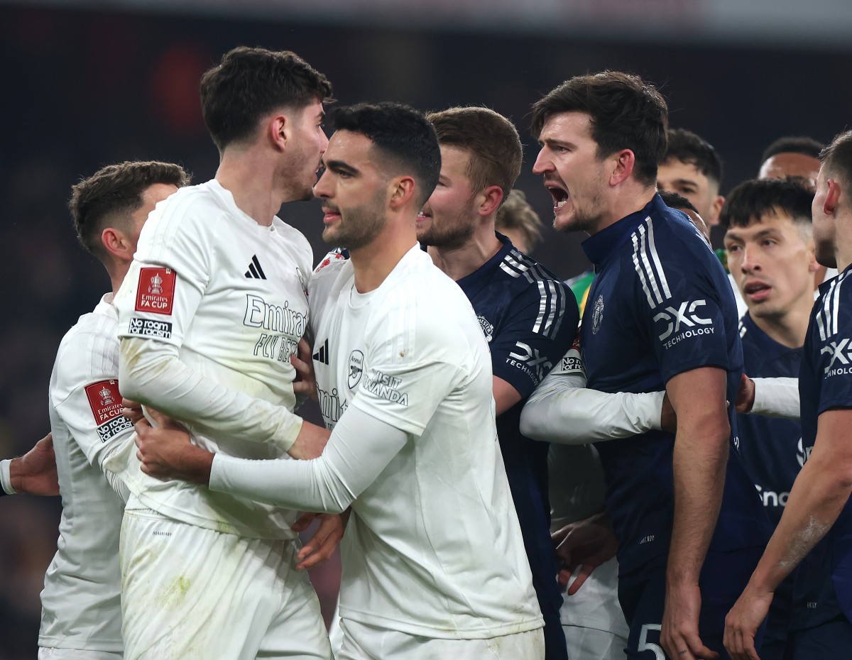 Kai Havertz and Harry Maguire clash